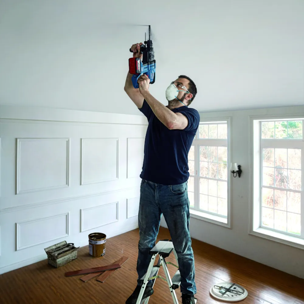 Набор аккумуляторного инструмента Bosch Professional: угловая шлифмашина GWS 180-LI с перфоратором GBH 180-LI (2 х 4 Ач, ЗУ), 0615990N05