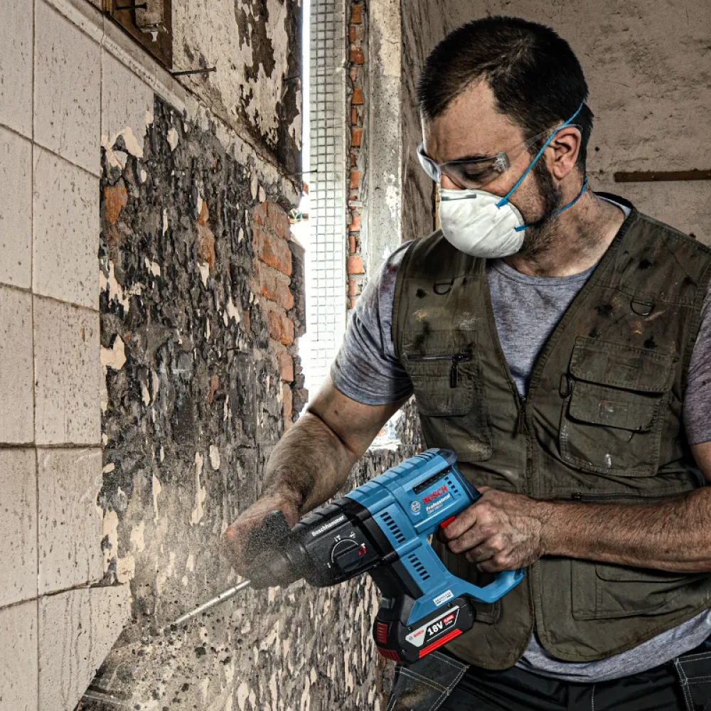 Набор аккумуляторного инструмента Bosch Professional: угловая шлифмашина GWS 180-LI с перфоратором GBH 180-LI (2 х 4 Ач, ЗУ), 0615990N05